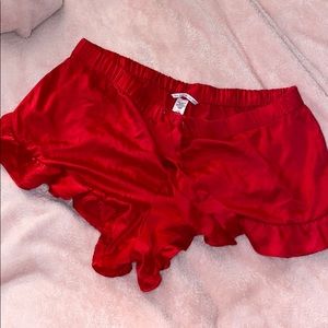 Victoria’s Secret red silk shorts. Size large.